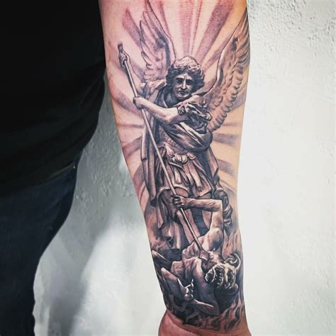 tattoos of st michael|st michael tattoo designs men.